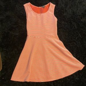 BeBop knee length coral dress with thin white stripes. Size medium.